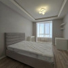 Prima chirie! Apartament cu 2 camere + living în Centru, N. Testemițanu.  thumb 11